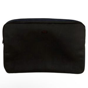 Men's black and blue Tumi laptop cover with exposed zipper and tonal hardware.